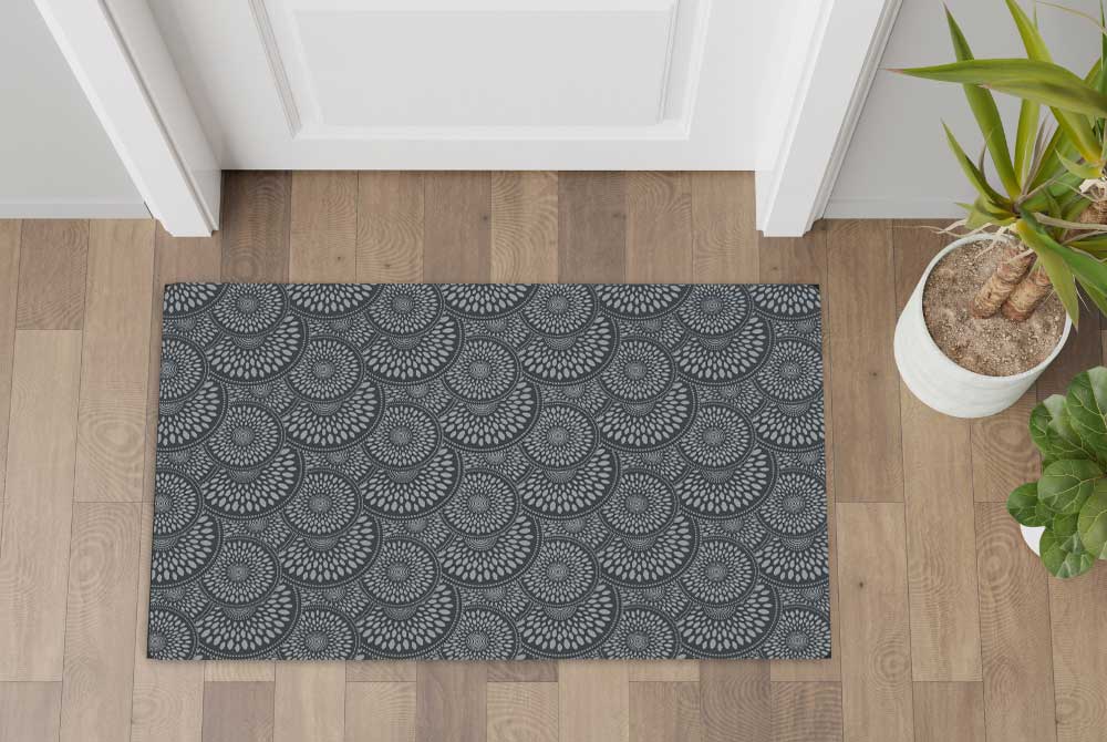 How do floor mats help protect the floor?